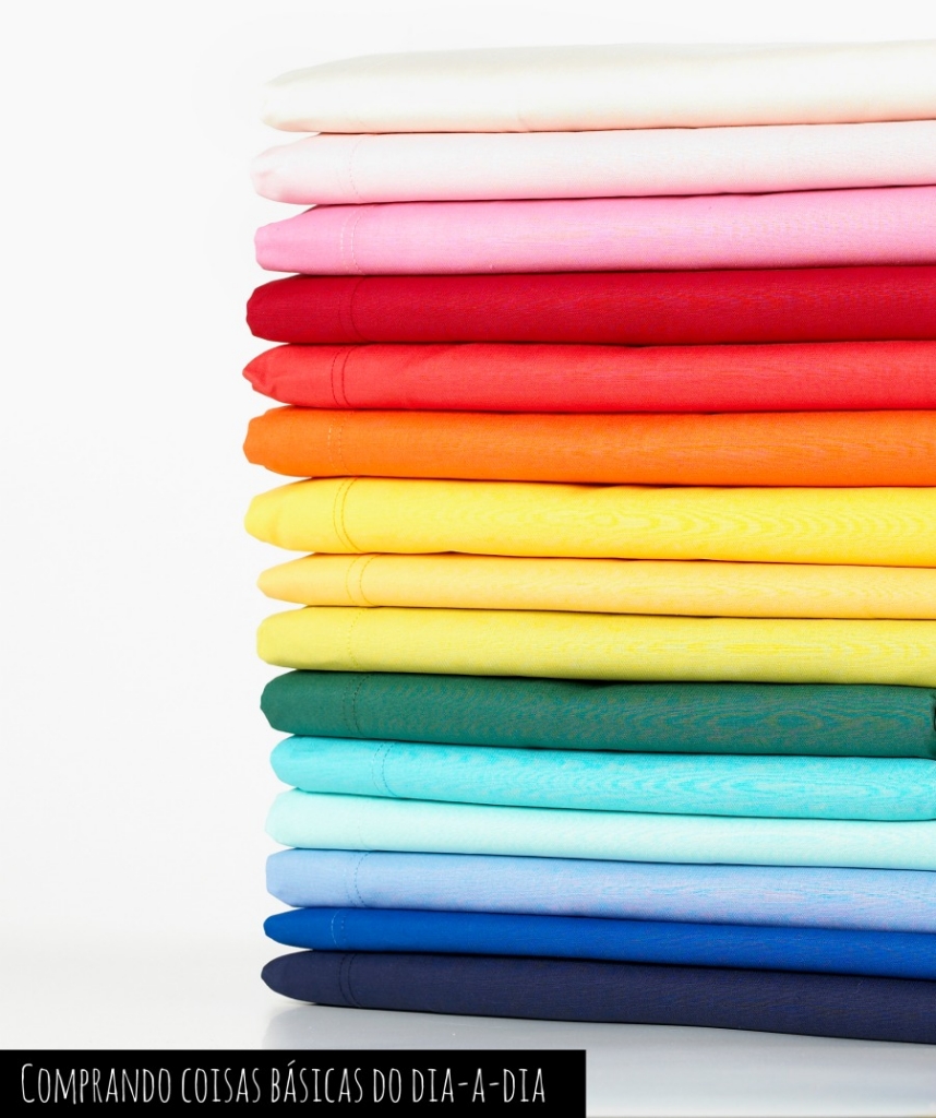 Stack of coloured linens isolated on white background
